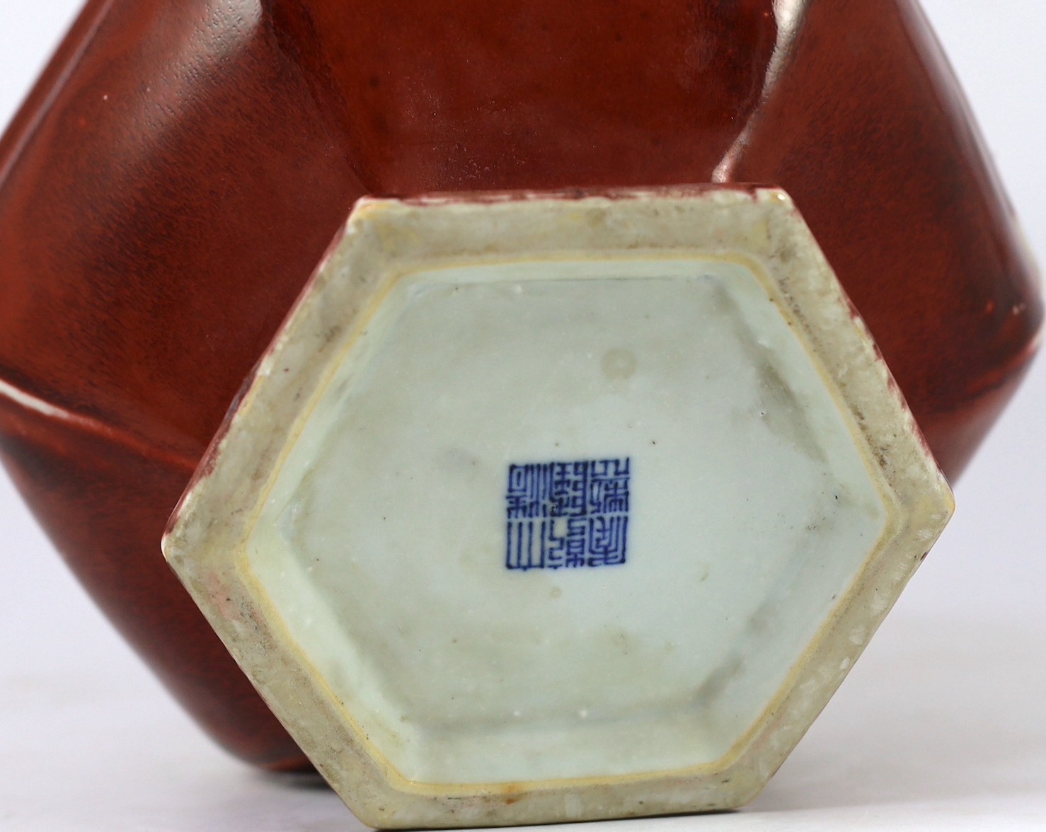 A Chinese copper red glazed hexagonal hu vase, late 19th/early 20th century, 28cm high